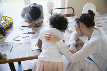 Mother and children coloring at dining table - HOXF03746