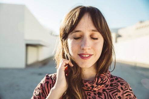 Portrait of a woman with closed eyes, daydreaming - SUF00556