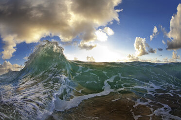 Two waves crashing into each other, in the early morning light. - AURF01678