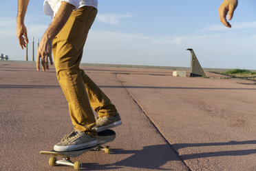 Legs of a skateboarder on a lane - AFVF01477