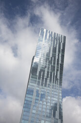 Poland, Warsaw, part of glass facade of modern apartment tower - FCF01480