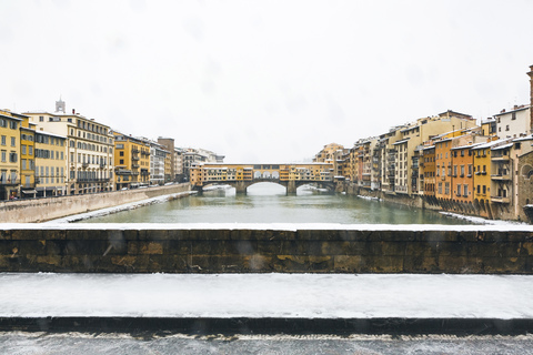 Italy, Florence, view to Ponte Vecchio on a snowy day stock photo