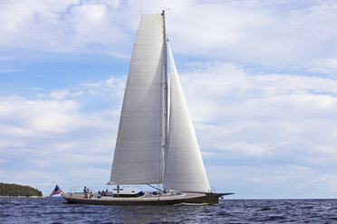 A newly built luxury yacht sails along the coast of Maine. - AURF02020