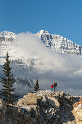 A woman and her daughter hiking near the Saskatchewan River below the Canadian Rockies, Banff National Park, Alberta, Canada. - AURF02088