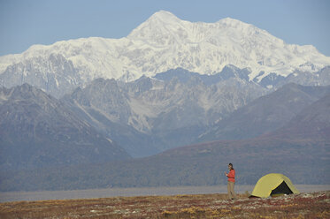 Backpacker camping on Kesugi Ridge Trail in Denali State Park, Alaska. - AURF02149