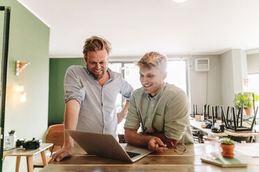 Business partners having a meeting in their new start-up company - GUSF01266