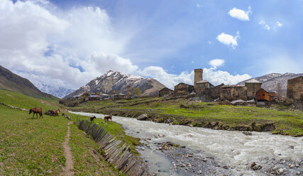 Georgia, Ushguli, Historic denfense towers made from stone at Enguri river - WWF04339