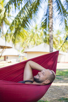 Man Relaxing In Hammock - AURF02425