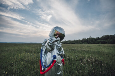 Spaceman exploring nature, giving the finger - VPIF00586