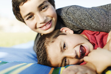 A hispanic family enjoys time together at a park in San Diego, Ca. - AURF02619