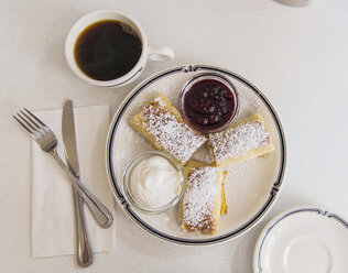 Blintzes and coffee on table - AURF03033