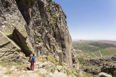 Climber checking a line. - AURF03060