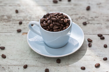 Espresso cup of roasted coffee beans - JUNF01158