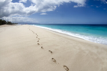 Footsteps on the beach at Pupukea, on Oahu's north shore. - AURF03160