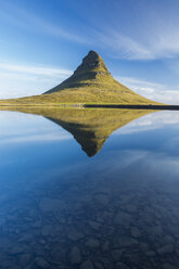 Kirkjufell mountain reflected in a small pond in western Iceland. - AURF03256
