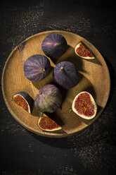 Figs on wooden plate, dark wood - MAEF12729