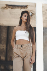 Portrait of a fashionable teenage girl with long brown hair - ACPF00310