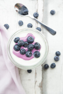 Glass of Greek yogurt with blueberries - LVF07404