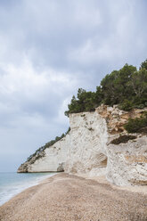 Italy, Vieste, empty Vignanotica Beach on a rainy winter day - FLMF00005