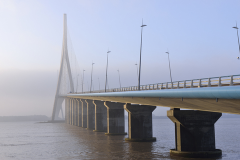 France, Le Havre, Pont de Normandie in morning mist stock photo