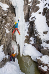 A man and woman ice climbing near Ouray, Colorado. - AURF04040