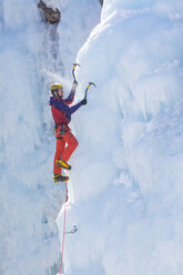 A man ice climbing near Ouray, Colorado. - AURF04041