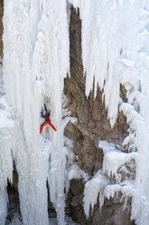 A man ice climbing near Ouray, Colorado. - AURF04042