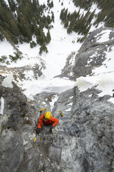 A man ice climbing near Ouray, Colorado. - AURF04044