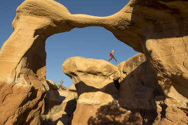 A young girl hiking in the Devil's Garden, Escalante, Utah. - AURF04187