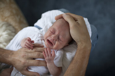 A Father Comforts And Consoles His Crying Newborn Baby - AURF04439