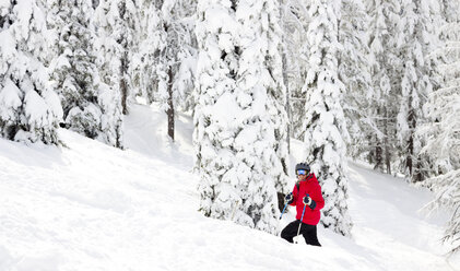 A Female Skier While Enjoying A Powder Day At Whitefish Mountain Resort - AURF04455