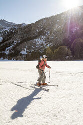 A young girl skiing on a frozen lake, Tom's Place, California. - AURF04616