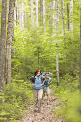 A Young Couple Hiking On The Appalachian Trail - AURF04659