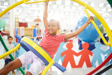 Girl using gyroscope in science center - CAIF22103