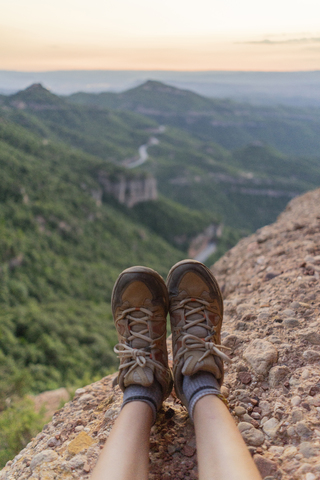 Spain, Barcelona, Montserrat, feet of resting man stock photo