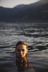 Portrait of beautiful young woman in a lake - MRAF00303