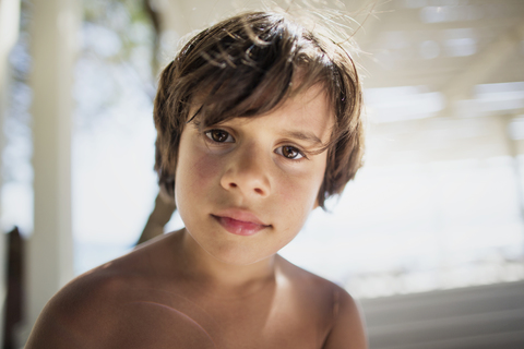 Portrait of little boy on the beach stock photo