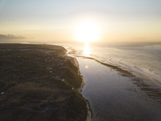 Indonesia, Bali, Aerial view of Green Bowl beach at sunrise - KNTF01572