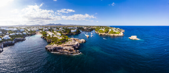 Spain, Mallorca, Portocolom, Aerial view of Cala d'Or and bay Cala Ferrera - AMF05927