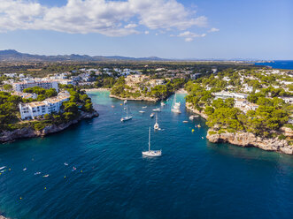 Spain, Mallorca, Portocolom, Aerial view of Cala d'Or and bay Cala Ferrera - AMF05932