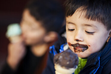 Japanese American boys eating ice cream cone - AURF05185