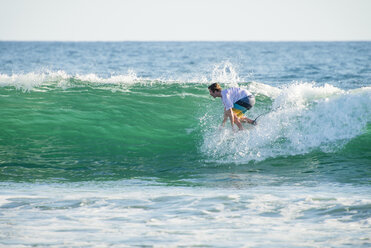 Man Surfing On Waves At Baja California Sur, Mexico - AURF05250