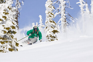 Male Skier Makes A Turn In Fresh Powder In The Whitefish Range Near Whitefish, Montana - AURF05293
