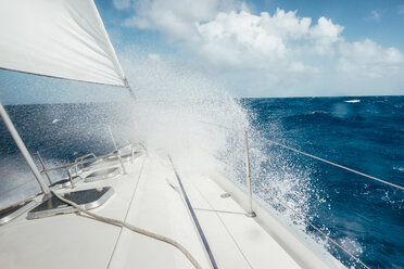 On board view of a boat sailing in rough seas in the Caribbean - AURF05372