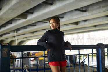 Portrait of an asian-american woman in athletic clothing. - AURF05383