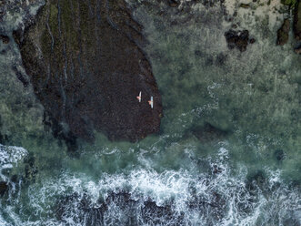 Indonesia, Bali, Aerial view of Bingin beach, two surfers - KNTF01712