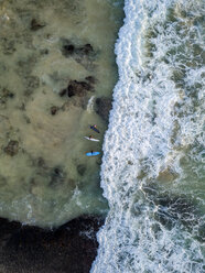 Indonesia, Bali, Aerial view of Dreamland beach, three surfers from above - KNTF01738