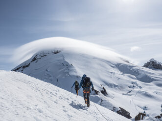 Two climbers on the summit of Colax Peak, Washington. - AURF05692