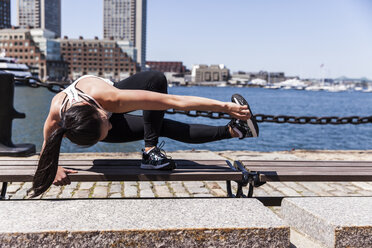 Woman Doing Exercise On The Bench Near River - AURF05746