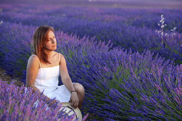 Woman Relaxing In The Field Of Lavender - AURF05764